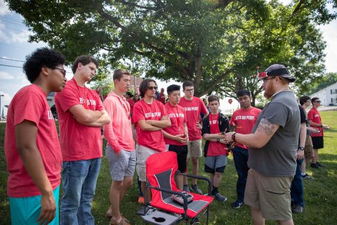 Michael Hunter of the Drone Club at Austin Peay State University shows off one of his racing drones to the Governor's School for Computational Physics students. (APSU)