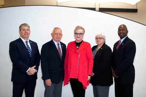 APSU President Alisa White (center) stands with Scott Brower, Gary Luck, Robin Mealer and Ronald Bailey, four retired generals now working for Austin Peay State University.