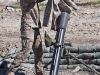 U.S. Army Sgt. Samuale Skogen, a mortarman with Company C, 3rd Battalion, 187th Infantry Regiment, 3rd Brigade “Rakkasans,” 101st Airborne Division (Air Assault), pulls a rain cover off a 120 mm mortar tube during a training exercise, March 1, 2013, at Combat Outpost Bowri Tana. The mortar section conducts drills daily to ensure they can be ready to fire quickly when called upon. (U.S. Army Photo by Spc. Alex Kirk Amen, 115th Mobile Public Affairs Detachment)