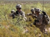 Soldiers with 1st Battalion, 26th Infantry Regiment, 2nd Brigade Combat Team, 101st Airborne Division, from Fort Campbell, Kentucky, call on the radio while conducting a live fire exercise during Network Integration Evaluation 17.2, July 14, Dona Ana Range Complex, New Mexico. 2nd BCT, 101st ABN DIV is the first rotational unit to participate in NIE. (Sgt. Maricris C. McLane)