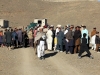 Villagers gather to receive various items during a humanitarian aid distribution mission near Forward Operating Base Salerno, Afghanistan, Dec. 10, 2012. Soldiers from Company A, 3rd Special Troops Battalion, 3rd Brigade Combat Team “Rakkasans,” 101st Airborne Division (Air Assault), assisted the Afghan Uniformed Police in distributing school supplies for the local school children in order to build relations between the village and the AUP. (U.S. Army photo by 1st Lt. John Zaehringer, 3rd STB Unit Public Affairs Representative)