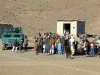 Villagers gather to receive various items during a humanitarian aid distribution mission near Forward Operating Base Salerno, Afghanistan, Dec. 10, 2012. Soldiers from Company A, 3rd Special Troops Battalion, 3rd Brigade Combat Team “Rakkasans,” 101st Airborne Division (Air Assault), assisted the Afghan Uniformed Police in distributing school supplies for the local school children in order to build relations between the village and the AUP. (U.S. Army photo by 1st Lt. John Zaehringer, 3rd STB Unit Public Affairs Representative)