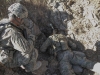 Sgt. Nathan Fleshman, an infantryman assigned to Company C, 3rd Battalion, 187th Infantry Regiment, 3rd Brigade Combat Team “Rakkasans,” 101st Airborne Division (Air Assault), investigates a small cave for weapons and insurgent activity near Combat Outpost Bowri Tana, Afghanistan, Nov. 30th, 2012. (U.S. Army photo by Sgt. 1st Class Abram Pinnington, Task Force 3/101 Public Affairs)