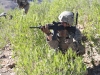 Sgt. Nathan Fleshman, an infantryman assigned to Company C, 3rd Battalion, 187th Infantry Regiment, 3rd Brigade Combat Team “Rakkasans,” 101st Airborne Division (Air Assault), looks into an advanced optic to assist him in identifying potential enemy movement on a nearby mountainside while his fellow infantrymen search for signs of insurgent activity near Combat Outpost Bowri Tana, Afghanistan, Nov. 30th, 2012. (U.S. Army photo by Sgt. 1st Class Abram Pinnington, Task Force 3/101 Public Affairs)