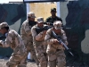 A team of Iraqi army ranger students conducts a glass house room clearing drill as their leadership watches at Camp Taji, Iraq, July 18, 2016. This drill, conducted within a diagram or outline of a building, allows the students to practice room clearing techniques while in full view of their trainers. Camp Taji is one of four Combined Joint Task Force – Operation Inherent Resolve build partner capacity locations dedicated to training Iraqi security forces. (U.S. Army photo by 1st Lt. Daniel Johnson/Released)