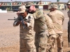 U.S. Army Staff Sgt. Brandon Blanton, center, a trainer with Company A, 1st Battalion 502nd Infantry Regiment, Task Force Strike, assists Iraqi army ranger students during a room clearing drill at Camp Taji, Iraq July 18, 2016. Students were first instructed as a whole by their leadership, then broken into small groups for practice. Camp Taji is one of four Combined Joint Task Force – Operation Inherent Resolve build partner capacity locations dedicated to training Iraqi security forces. (U.S. Army photo by 1st Lt. Daniel Johnson/Released)