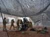 U.S Army Soldiers with Battery C, 1st Battalion, 320th Field Artillery Regiment, Task Force Strike, execute a fire mission to support the Iraqi security forces during the Mosul counter offensive, Dec. 24, 2016, in northern Iraq. Battery C is supporting the ISF with indirect fires in their fight against the ISIL. (U.S Army Photo by 1st Lt. Daniel Johnson)