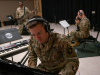 Spc. Michael Davis, pianist, 101st Airborne Division Air Assault Band plays the piano while recording ‘Light of the Gold Star’ at Columbia Studio A in Nashville on October 26. (US Army photo by Sgt. Patrick Kirby, 40th PAD)