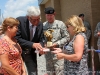 Mayor Dan Potter and his wife  presents Maj. Gen. Schloesser with gifts from the People of Oak Grove, Ky