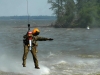 Sgt. Blake Armstrong, a flight medic with Company C, 6th Battalion, 101st Aviation Regiment, 101st Combat Aviation Brigade, uses a hoist June 29, 2017 near Scott Air force Base during over-water training. The training was used to simulate rescuing someone from a life raft while stranded in open water. (Sgt. Marcus Floyd, 101st Combat Aviation Brigade)