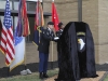 Spc. Marc A. Monreal (left), a native of Los Angeles, California, and Spc. Jonathon D. Crump (right), a native of Huston, Texas, assigned to the 101st Financial Management Support Unit, 101st Special Troops Battalion, 101st Airborne Division (Air Assault) Sustainment Brigade, 101st Abn. Div., prepare to unveil the memorial during the memorial rededication ceremony, June 25, 2017, at the Defense Military Pay Office on Fort Campbell, Kentucky. (Sgt. Neysa Canfield/101st SBDE Public Affairs)