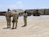 Polish Forces soldiers observes the heavy expanded tactical truck, a recovery vehicle also known as the A4 wrecker, as it tows away their Rosomak Polish vehicle during the Polish master driver training Aug. 7, 2013 at Bagram Air Field, Parwan province, Afghanistan. Soldiers of the 536th Support Maintenance Company, 157th Combat Sustainment Support Battalion in support of Task Force Lifeliner, provided this training to the Polish on how to use the A4 wrecker recovery vehicles. Although the soldiers were the instructors for this training they also had the opportunity to learn from the Polish new techniques and build a good relationship with them. (U.S. Army photo by Sgt. Sinthia Rosario, Task Force Lifeliner Public Affairs)