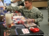 Sergeant Bowron puts out new goodies for attendees interested in the Tennessee National Guard