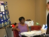 Ruth Gordon from the Clarksville Dental Center talking with Lashawn Evans