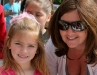 A mother and daughter in line for some cotton candy