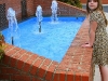 A young girl admires the fountain at the Clarksville Transit System Bus Station