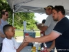 A young man receives a refreshing sno cone 