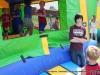 Montgomery Central High School student Alex Hornick helping at the inflatable.