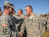 Command Sgt. Maj. Brandon Haywood, the command sergeant major of the 2nd Brigade Combat Team, 101st Airborne Division (Air Assault), congratulates of Spc. Tyler Price, a combat engineer on Strike Team 1 with Strike’s Company A, 2nd Brigade Special Troops Battalion, after his team completed their final event in the Fort Campbell Sapper Stakes 2012 held at the post’s Demolition Range 39 and Training Area 44, Oct. 23rd-24th. (U.S. Army photo by Sgt. Joe Padula, 2nd BCT PAO, 101st Abn. Div.)