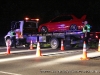 An officer speaks to a wrecker driver, all motorists are treated equally