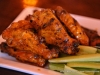 Grilled Wings with Tilted Kilt Signature sauce.