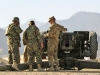 Master Sgt. Liviu Ivan (right), the D-30 Howitzer subject matter expert assigned to 3rd Battalion 320th Field Artillery Regiment, 3rd Brigade Combat Team \"Rakkasans,\" 101st Airborne Division (Air Assault), helps soldiers with the Afghan National Army\'s 203rd Corps, 1st Infantry Brigade, 4th Kandak, D-30 Heavy Coy, check the gun systems before firing at Camp Parsa, Afghanistan, Jan. 9, 2013.  (U.S. Army photo by Spc. Brian Smith-Dutton, Task Force 3/101 Public Affairs)