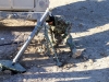 An Afghan National Army soldier with the 1st Kandak, 1st Coy, prepares his mortar position before Afghan National Security Forces and U.S. Soldiers with Company D, 1st Battalion, 187th Infantry Regiment, 3rd Brigade Combat Team “Rakkasans,” 101st Airborne Division (Air Assault), conduct a joint mission in rural portions of Zormat District, Afghanistan, Dec. 10, 2012. ANSF conducted all clearing and questioning operations, while the Rakkasans of Company D, 1-187, assisted in facilitating aerial support while supplying additional ground forces. (U.S. Army photo by Sgt. 1st Class Abram Pinnington, Task Force 3/101 Public Affairs)