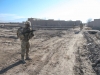 An infantry squad leader assigned to Company D, 1st Battalion, 187th Infantry Regiment, 3rd Brigade Combat Team “Rakkasans,” 101st Airborne Division (Air Assault), looks back on one of his infantry teams during a foot patrol during an Afghan National Security Forces-led mission in rural areas of Zormat District, Afghanistan, Dec. 10, 2012. ANSF conducted all clearing and questioning operations while the Rakkasans of Company D, 1-187, assisted in facilitating aerial support while supplying additional ground forces. (U.S. Army photo by Sgt. 1st Class Abram Pinnington, Task Force 3/101 Public Affairs)