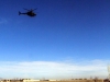 Soldiers assigned to Company D, 1st Battalion, 187th Infantry Regiment, 3rd Brigade Combat Team “Rakkasans,” 101st Airborne Division (Air Assault), conduct a foot patrol while an UH-57 Kiowa helicopter provides aerial support during an Afghan National Security Forces-led mission in Zormat District, Afghanistan, Dec. 10, 2012. (U.S. Army photo by Sgt. 1st Class Abram Pinnington, Task Force 3/101 Public Affairs)