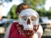 Sam Melber of Beta Beta Beta said: "When people come to our table, a lot of them are just curious, we have a lot of skulls and stuff out. We're trying to reach out to people in biology majors and those who aren't in biology. They can see what we're doing." (APSU student Benny Little)