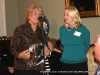 Jean Gilbert receives a service award from AHDC Exec Dir Diane Batson-Smith.