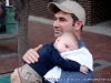 A father takes care of his lil' man