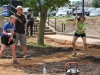 Lt. Col. Brian Jovag, chief of physical therapy at Blanchfield Army Community Hospital, teaches his 11-year-old daughter Krista and 14-year-old daughter Kamie how to swing a pickaxe in the hospital's new on-site therapeutic garden May 23, 2014 at Fort Campbell. More than 20 BACH staff members and local community members came together to build the garden, which will be used as therapy for wounded, injured and ill Soldiers while providing organic fruit and vegetables for the hospital's dining facility. (U.S. Army photo by Stacy Rzepka/RELEASED)