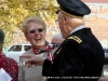 County Commissioner Martha Brockman speaks with Chaplin Charles Currie