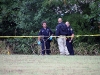Clarksville Police investigate the scene where a deceased male body was found. (Photo by CPD)