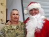 Command Sgt. Maj. Jeffrey Griffith, Battalion operations senior non-commissioned officer in charge, 3rd Battalion, 187th Infantry Regiment, 3rd Brigade Combat Team “Rakkasans,” 101st Airborne Division (Air Assault), poses with Santa Clause during a celebration at Forward Operating Base Salerno, Afghanistan, Dec. 24th, 2012. (Courtesy photo)