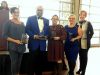 Megan Rivera, Sheldon Huber, Joann Garcia, and Melissa Powers Receiving Educational Achievement Awards