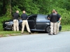 Clarksville Police investigate the scene where a man was found deceased in his 2009 Subaru Impreza. (Photo by CPD-Jim Knoll)