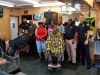 Clarksville Police Department visit with people at Keesee Barbershop during their third "Chat and a Cut" community outreach event.