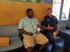 Clarksville Police Department visit with people at Keesee Barbershop during their third "Chat and a Cut" community outreach event.