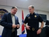 Lt Dale Ward receives his certificate and service weapon from Chief Al Ansley and receives a knife engraved with his name from the District 3 Criminal Investigations Unit.