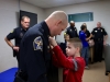 Lt Daniel Lane receives his Lieutenant Badge was pinned on by his son, Caleb Lane.