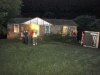 Stolen building supply truck crashes into the side of a house. (Photo by CPD-Jim Knoll)