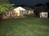 Stolen building supply truck crashes into the side of a house. (Photo by CPD-Jim Knoll)