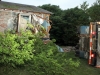 Stolen building supply truck crashes into the side of a house. (Photo by CPD-Jim Knoll)