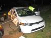 2008 Honda Civic turns in front of EMS Ambulance running Emergency Traffic on Tiny Town Road. The ambulance collided with the Civic which then went down an embankment. (Photo by CPD-Jim Knoll)