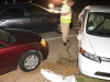 2008 Honda Civic turns in front of EMS Ambulance running Emergency Traffic on Tiny Town Road. The ambulance collided with the Civic which then went down an embankment. (Photo by CPD-Jim Knoll)