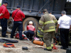 Clarksville emergency crews work to free Scott Flitsch's leg from underneath a dump truck. (Jim Knoll, Clarksville Police Department)