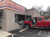 A pickup truck loses control on Madison Street and then crashes into the Edge Salon. (Jim Knoll/Officer Holder, Clarksville Police)