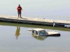 1983 Dodge Pickup being pulled out of the water at Liberty Park's Freedom Point.